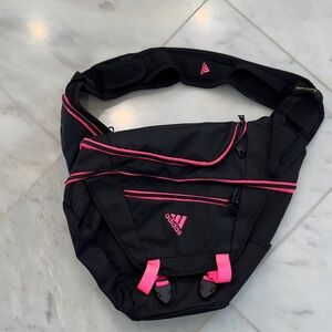 Adidas Black Backpack with Bright Pink Accents and Crossbody strap.